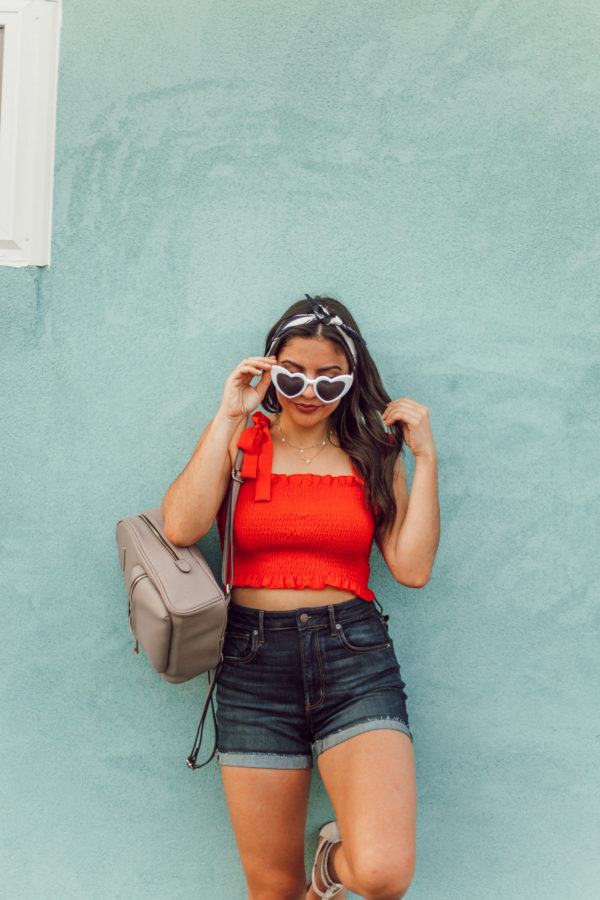 Red crop top with high waisted denim shorts